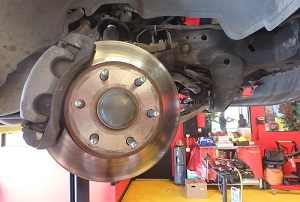 Rear pad rotor replacement at ASE brake shop