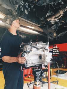 Auto Service Experts Mechanic Rebuilding Transmission for Acura 3.2