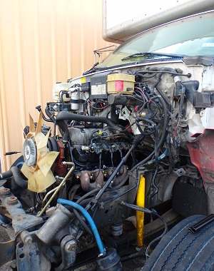 Engine repair on San Antonio Moving Fleet Truck at Auto Service Experts