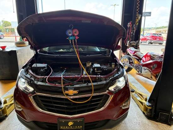 Car AC Mechanics performing AC Check at Auto Service Experts