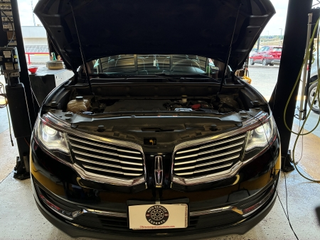 Electronic diagnostic on Lincoln MKX for power steering failure - Auto Repair San Antonio | Auto Service Experts Running an electronic diagnostic on a Lincoln MKX to troubleshoot a power steering failure.