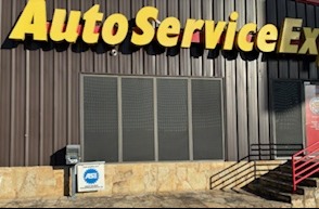 ASE Certification displayed in front of Auto Service Experts Hill Country Village Mechanic Shop - Auto Repair San Antonio | Auto Service Experts ASE Certification Sign prominently displayed in front of shop verifying ASE Master Technician Status of our Hill Country Village Mechanics.