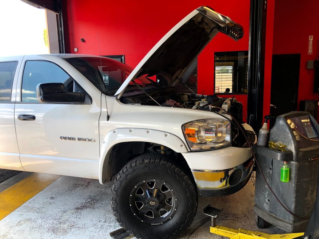 07 Dodge Ram 1500 57 AC condenser fan 2 - Auto Repair San Antonio | Auto Service Experts ASE technician performing AC diagnostic on 2007 Dodge Ram 1500 5.7L with condenser fan 2 issue in San Antonio repair shop