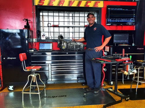 Owner and ASE Certified Master Mechanic at San Antonio Auto Service Experts Emphasizes Shop Mechanic Efficiency - Auto Repair San Antonio | Auto Service Experts Owner and ASE Certified Master Mechanic at San Antonio standing inside Auto Service Experts shop which emphasizes shop & mechanic efficiency.