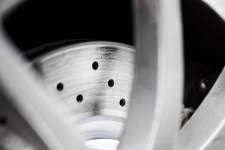 Scored brake rotor causing pedal vibration diagnosed at Auto Service Experts auto repair.