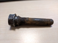 corroded-caliper slide - -pin-brake-noise-diagnosis-san-antonio - Auto Repair San Antonio | Auto Service Experts Corroded brake caliper slide pin restricting movement and creating uneven pad pressure