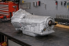 ford-f250-10r140-torqshift-transmission-heavy-duty – Auto Repair San Antonio | Auto Service Experts Heavy-duty Ford F250 10R140 TorqShift transmission positioned on a shop bench in San Antonio, where the unit is being prepared for testing and internal evaluation by the team