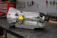 ford-mustang-6r80-transmission-torque-converter – Auto Repair San Antonio | Auto Service Experts Ford & Lincoln 6R80 transmission with torque converter exposed, being evaluated for performance issues by Mario Negron, Technician, during a detailed inspection