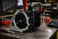 gm-6t70-6t75-internal-clutch-pack-inspection – Auto Repair San Antonio | Auto Service Experts Disassembled Chevy, GM, Buick & Cadillac 6T70 transmission showing clutch packs and internal components, helping explain how wear and contamination inside the unit can lead to delayed engagement and slipping