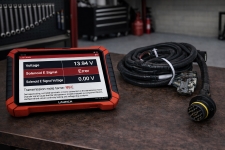 transmission-wiring-harness-connector-corrosion-inspection – Auto Repair San Antonio | Auto Service Experts Close-up of a transmission wiring harness and connector showing inspection for corrosion and loose terminals, with Mario Negron verifying signal integrity during electrical diagnosis